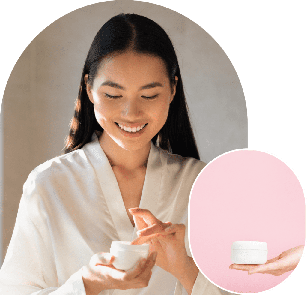 Woman applying cream from a small jar.