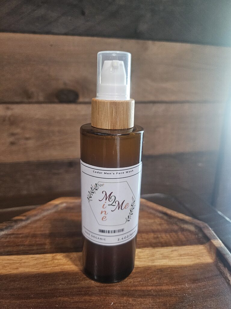 Brown bottle with spray cap on tray.